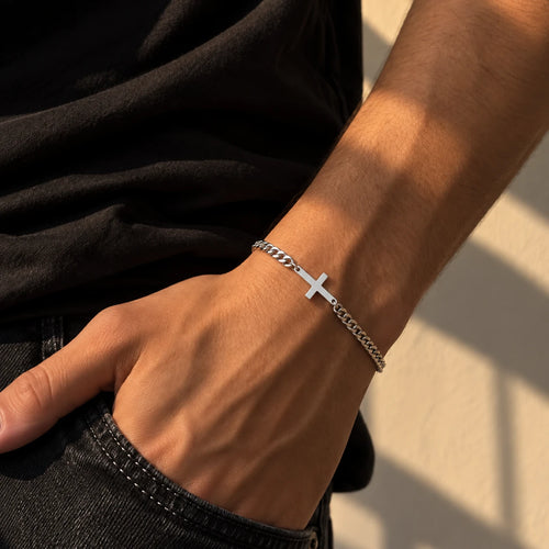 Cross chain bracelet in silver, worn